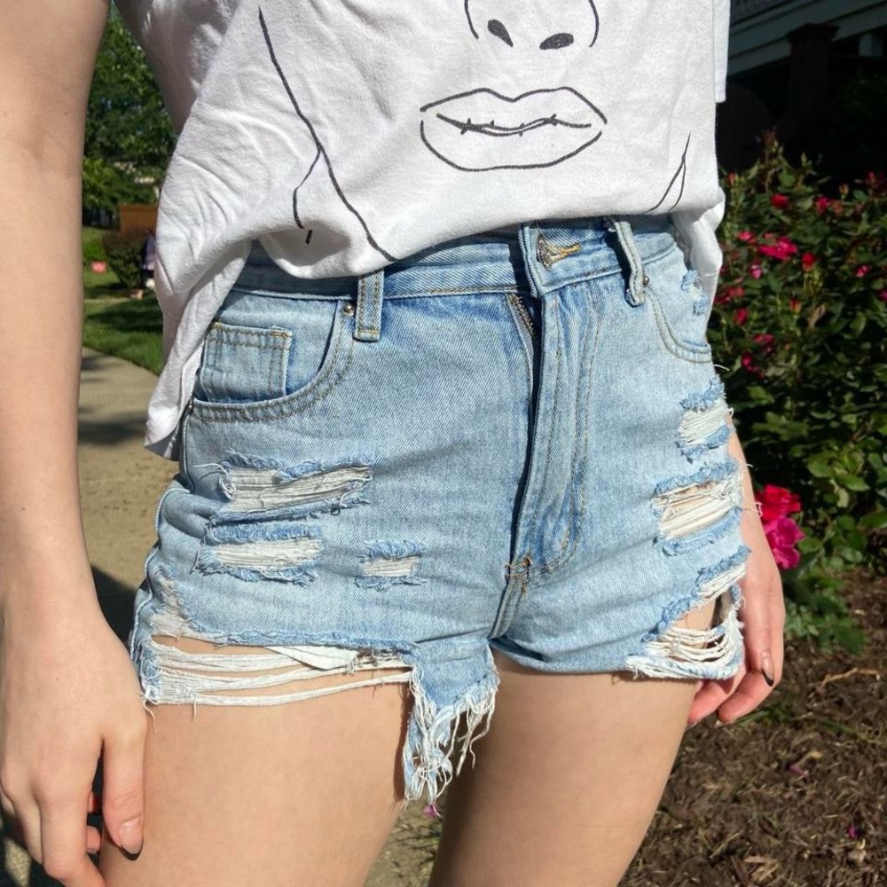 Distressed light wash jean shorts